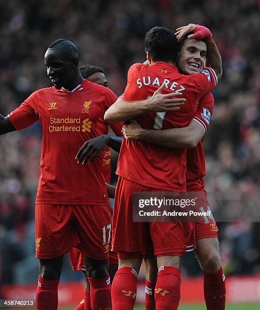 Luis Suarez of Liverpool celebrates during the Barclays Premier League match between Liverpool and Cardiff City at Anfield on December 21, 2013 in...