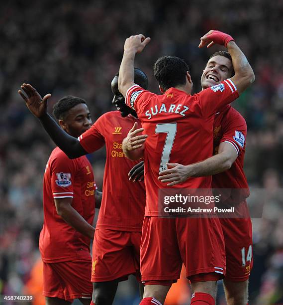 Luis Suarez of Liverpool celebrates during the Barclays Premier League match between Liverpool and Cardiff City at Anfield on December 21, 2013 in...