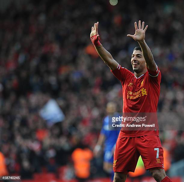 Luis Suarez of Liverpool celebrates during the Barclays Premier League match between Liverpool and Cardiff City at Anfield on December 21, 2013 in...