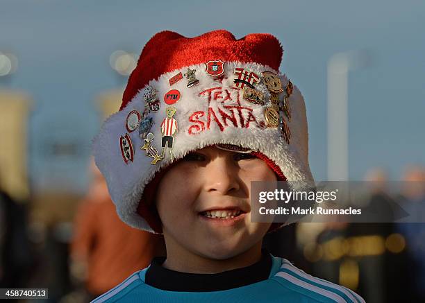 A young Sunderland fan with a festive hat during the Barclays Premier League match between Sunderland and Norwich City at the Stadium of Light on...