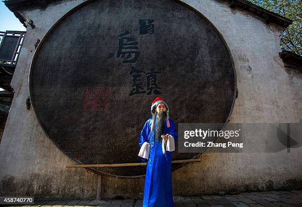 An artist from Shanghai Theatre Academy is performing classic Chinese Peking opera 'Yang Silang Visits His Mother'. The second Wuzhen Theater...