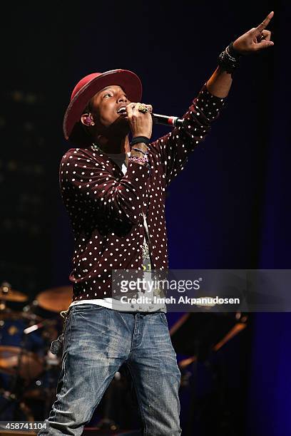 Singer/songwriter Pharrell Williams performs onstage at the 2014 Thelonious Monk International Jazz Trumpet Competition at Dolby Theatre on November...