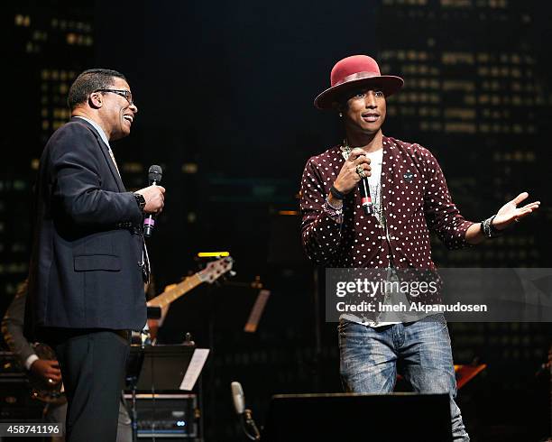 Musician Herbie Hancock and singer/songwriter Pharrell Williams perform onstage at the 2014 Thelonious Monk International Jazz Trumpet Competition at...