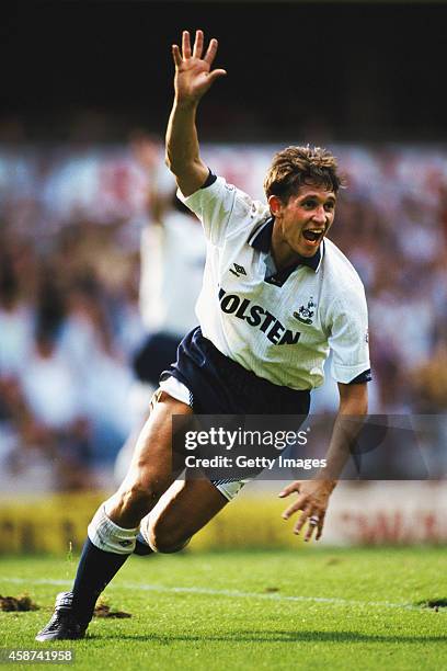 Spurs striker Gary Lineker celebrates after scoring the first goal during a 2-0 win over Queens Park Rangers in a League Division One match between...