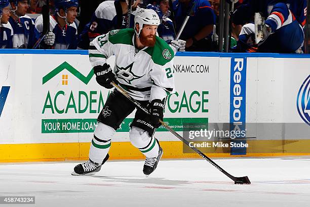 Jordie Benn of the Dallas Stars skates against the New York Islanders at Nassau Veterans Memorial Coliseum on October 25, 2014 in Uniondale, New...