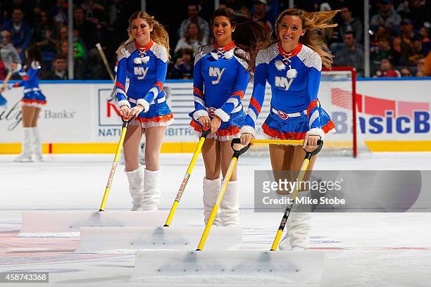 New York Islanders ice girls skate during the game between the New York Islanders and the Dallas Stars at Nassau Veterans Memorial Coliseum on...