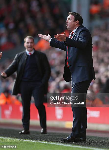 Cardiff City manager Malky Mackay shows his emotions during the Barclays Premier League match between Liverpool and Cardiff City at Anfield at...
