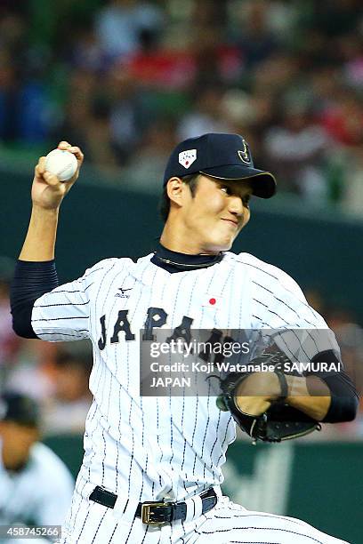 Starting pitcher Shintaro Fujinami of Samurai Japan pitches during the friendly match between Samurai Japan and Fukuoka SoftBank Hawks & Hokkaido...