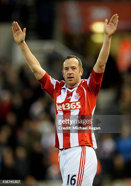 Charlie Adam of Stoke City celebrates as he scores their first goal during the Barclays Premier League match between Stoke City and Aston Villa at...