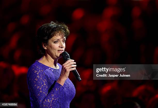 Performer Lenette van Dongen sings a song during a national commemoration ceremony for relatives and friends of the victims of the Malaysia Airlines...