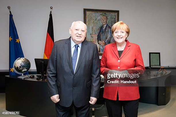 In this photo provided by the German Government Press Office German Chancellor Angela Merkel meets with former President of the Soviet Union Mikhail...