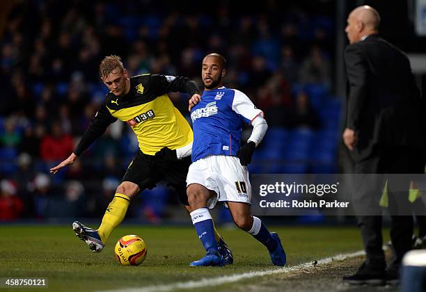 David McGoldrick of Ipswich Town is challenged by Joel Ekstrand of Watford during the Sky Bet Championship match between Ipswich Town and Watford at...