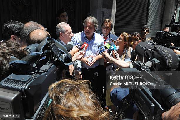 Former Uruguayan Economy Minister Fernando Lorenzo speaks with journalists upon leaving the court in Montevideo on December 21, 2013. Lorenzo...