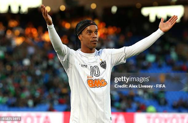 Ronaldinho of Atletico Mineiro celebrates after scoring his goal during the FIFA Club World Cup 3rd place match between Guangzhou Evergrande FC and...