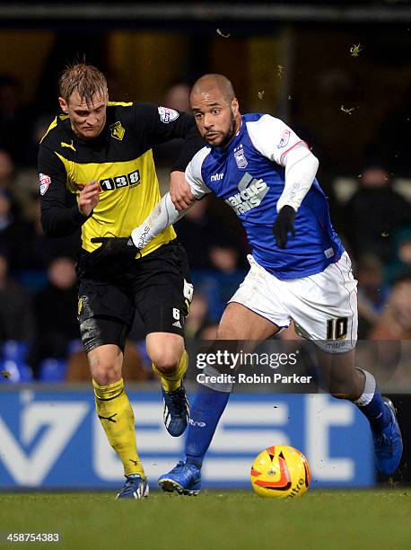 David McGoldrick of Ipswich Town is challenged by Joel Ekstrand of Watford during the Sky Bet Championship match between Ipswich Town and Watford at...