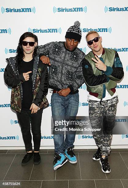 Skrillex, DJ Whoo Kid and Diplo visit SiriusXM Studios on November 10, 2014 in New York City.