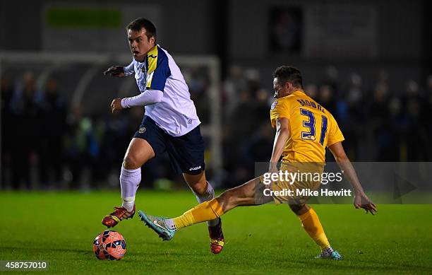 Scott Donnelly of Havant gets round Alan Browne of Preston during the FA Cup First Round match between Havant & Waterlooville FC and Preston North...