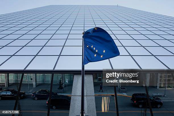 An Alaska state flag blows in the wind at the Robert B. Atwood Building in Anchorage, Alaska, U.S., on Wednesday, Nov. 5, 2014. Voters in Anchorage...