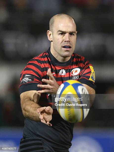 Charlie Hodgson of Saracens passes the ball during the Aviva Premiership match between Saracens and Leicester Tigers at Allianz Park on December 21,...