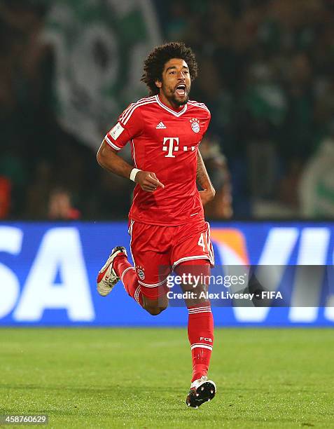 Dante of FC Bayern Munchen celebrates after scoring the opening goal during the FIFA Club World Cup Final between FC Bayern Munchen and Raja...