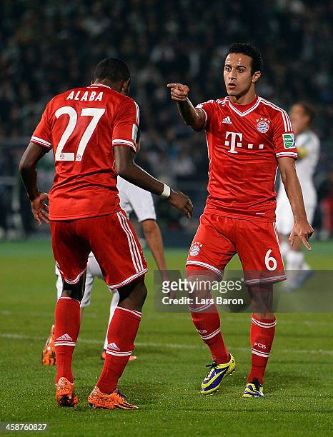 Thiago of Muenchen celebrates with David Alaba after scoring his teams second goal during the FIFA Club World Cup Final between FC Bayern Muenchen...