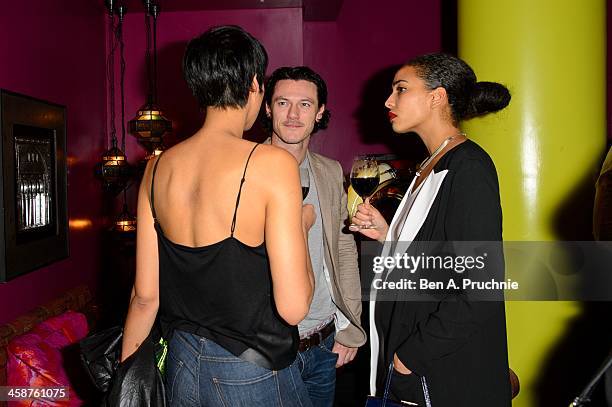 Zawe Ashton and Luke Evans attend the August: Osage County drinks & screening at Soho Hotel on December 21, 2013 in London, England.