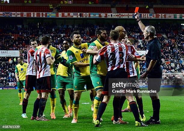 Wes Brown of Sunderland is sent off during the Barclays Premier League match between Sunderland and Norwich City at the Stadium of Light on December...