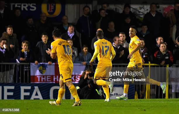 Callum Robinson of Preston celebrates after completing his hat-trick from the penalty spot during the FA Cup First Round match between Havant &...