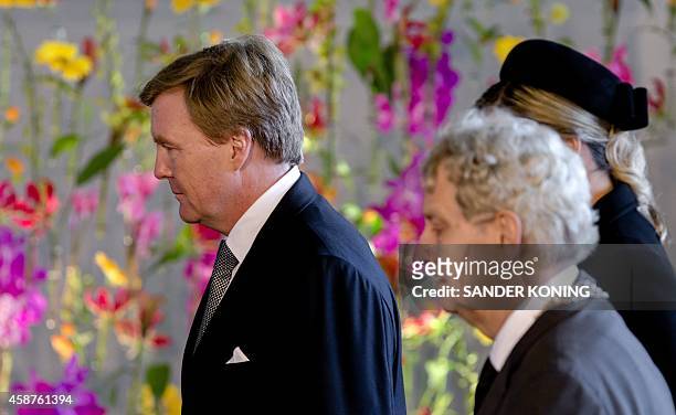 Dutch King Willem-Alexander, Major Ebenhard van der Laan and Queen Maxima arrive at the RAI congress Centre in Amsterdam, on November 10 for the...