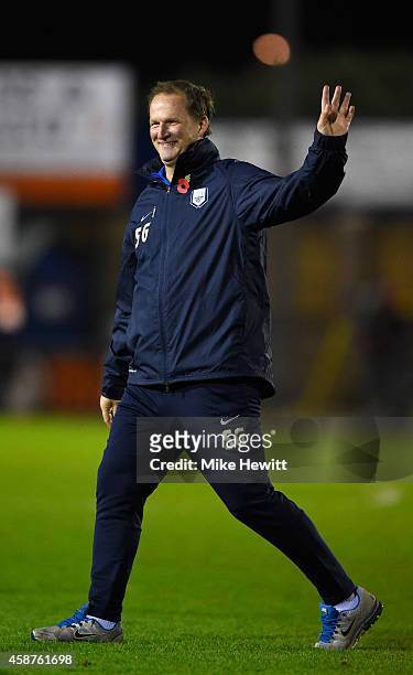 Preston manager Simon Grayson salutes the travelling fands at the end of the FA Cup First Round match between Havant & Waterlooville FC and Preston...