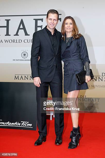 Oliver Bierhoff and his wife Klara Szalantzy attend the 'Die Mannschaft' Premiere at Sony Centre on November 10, 2014 in Berlin, Germany.