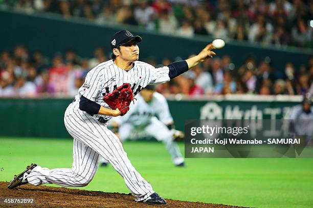 Pitcher Tomomi Takahashi of Samurai Japan pitches during the friendly match between Samurai Japan and Fukuoka SoftBank Hawks & Hokkaido Nipponham...