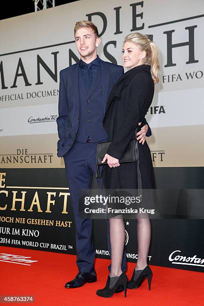 Christoph Kramer and his girlfriend Celina Lauterbach attend the 'Die Mannschaft' Premiere at Sony Centre on November 10, 2014 in Berlin, Germany.