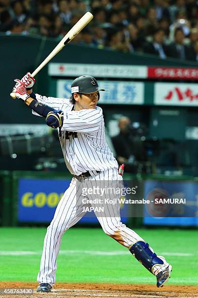 Infielder Hayato Sakamoto bats during the friendly match between Samurai Japan and Fukuoka SoftBank Hawks & Hokkaido Nipponham Fighters at Fukuoka...