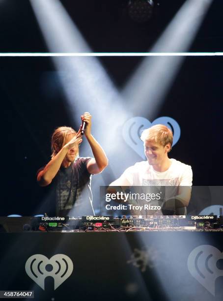 Armin van Buuren performs during Y 100 Jingle Ball at BB&T Center on December 20, 2013 in Sunrise, Florida.