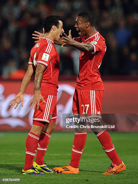 Thiago of Bayern Muenchen celebrates scoring their second goal with team-mate David Alaba during the FIFA Club World Cup Final match between Bayern...