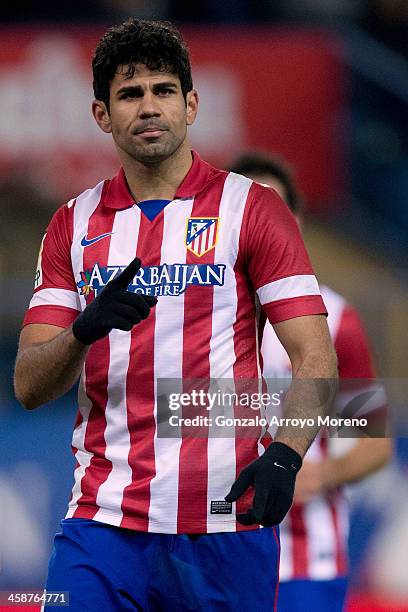 Diego Costa of Atletico de Madrid celebrates scoring their third goal during the La Liga match between Club Atletico de Madrid and Levante UD at...