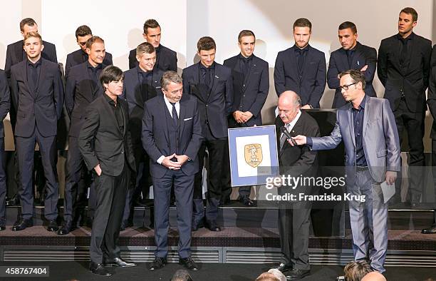 Germany's national football team coach Joachim Loew , Wolfgang Niersbach, President of German Football federation , FIFA president Joseph Blatter...