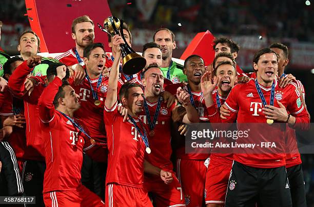 Philipp Lahm the captain of FC Bayern Munchen lifts the FIFA Club World Cup after victory in the FIFA Club World Cup Final between FC Bayern Munchen...