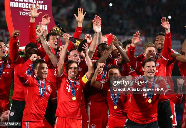 Philipp Lahm the captain of FC Bayern Munchen lifts the FIFA Club World Cup after victory in the FIFA Club World Cup Final between FC Bayern Munchen...