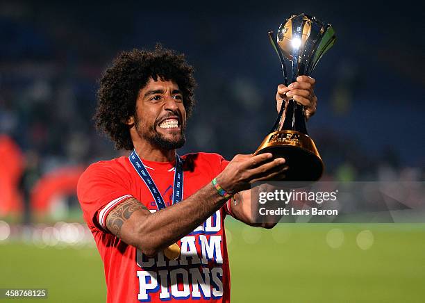 Dante of Muenchen celebrates with the trophy after winning the FIFA Club World Cup Final between FC Bayern Muenchen and Raja Casablanca at Marrakech...