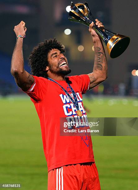 Dante of Muenchen celebrates with the trophy after winning the FIFA Club World Cup Final between FC Bayern Muenchen and Raja Casablanca at Marrakech...