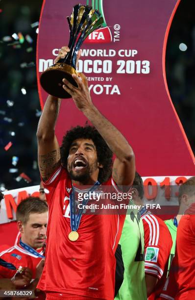 Dante of Bayern Munchen lifts the trophy after the FIFA Club World Cup Final match between FC Bayern Munchen and Raja Casablanca at the Marrakech...