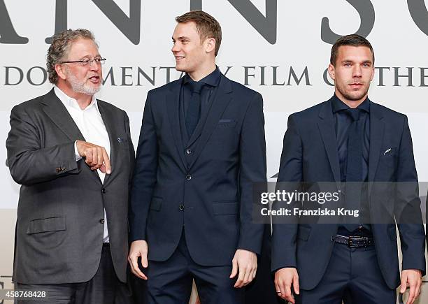 Martin Moszkowicz, Manuel Neuer and Lukas Podolski attend the 'Die Mannschaft' Premiere at Sony Centre on November 10, 2014 in Berlin, Germany.