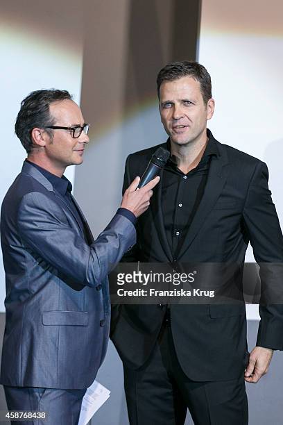 Oliver Bierhoff and Matthias Opdenhoevel attend the 'Die Mannschaft' Premiere at Sony Centre on November 10, 2014 in Berlin, Germany.
