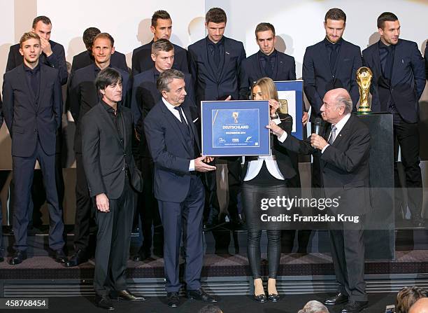 The German National Football Team, Joachim Loew, Wolfgang Niersbach and Joseph Blatter attend the 'Die Mannschaft' Premiere at Sony Centre on...