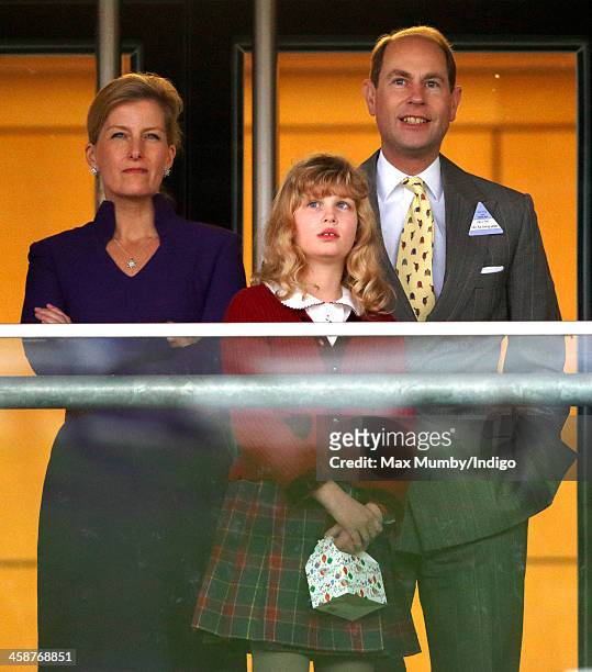 Sophie Countess of Wessex, Prince Edward, Earl of Wessex and their daughter Lady Louise Windsor watch the racing as they attend the Christmas Meeting...