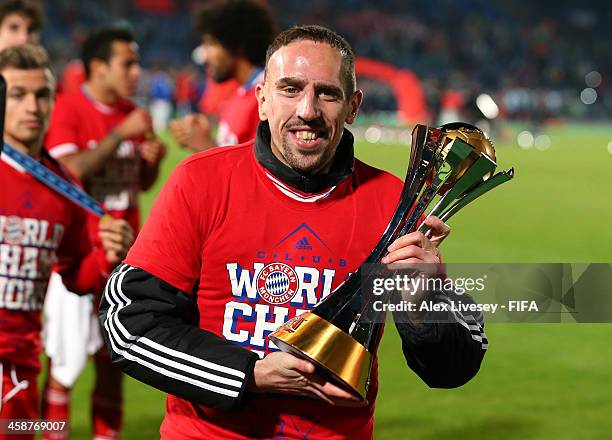 Franck Ribery of FC Bayern Munchen lifts the FIFA Club World Cup after victory in the FIFA Club World Cup Final between FC Bayern Munchen and Raja...