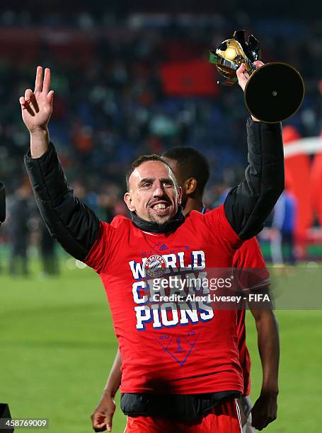 Franck Ribery of FC Bayern Munchen lifts the FIFA Club World Cup after victory in the FIFA Club World Cup Final between FC Bayern Munchen and Raja...