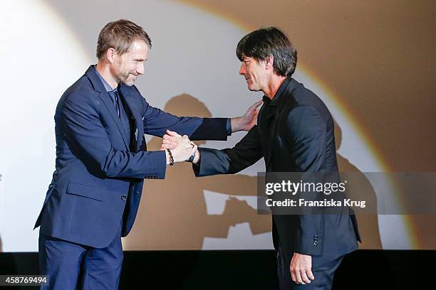 Martin Christ and Joachim Loew attend the 'Die Mannschaft' Premiere at Sony Centre on November 10, 2014 in Berlin, Germany.